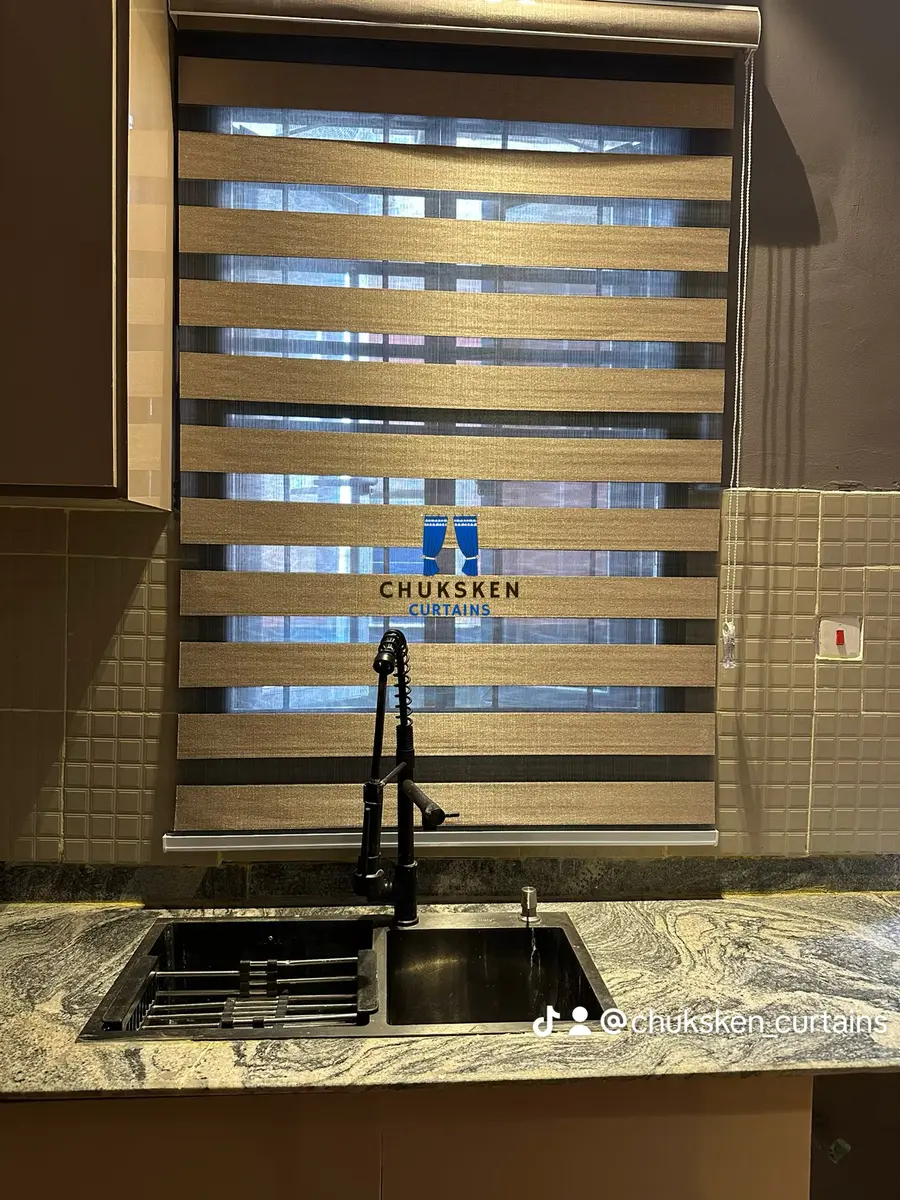 Zebra roller blind fitted above a kitchen sink